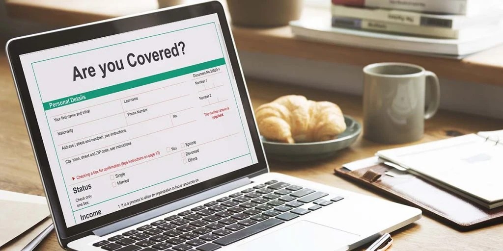 Insurance coverage form on a laptop